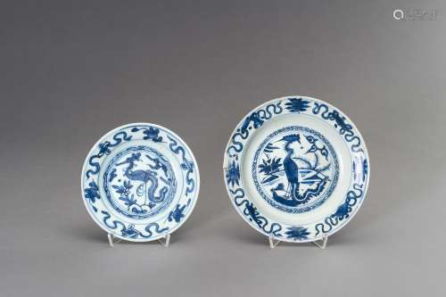 TWO BLUE AND WHITE 'PHOENIX' DISHES, LATE MING