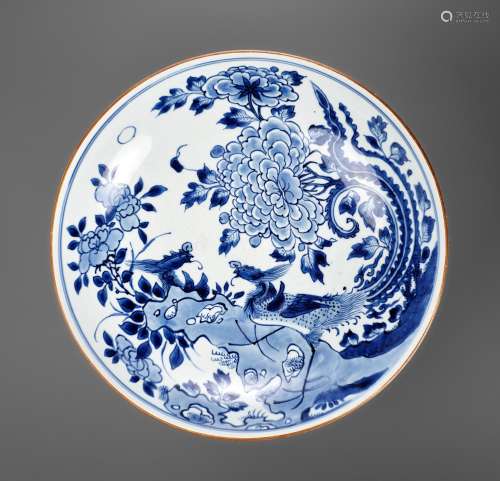 A LARGE BLUE AND WHITE 'PHOENIX AND PEONY' DISH, Y...