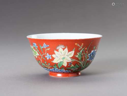 † A CORAL-GROUND 'FLORAL' WUCAI BOWL, QING