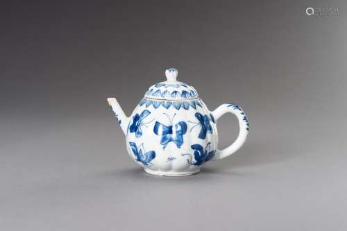 A BLUE AND WHITE 'BUTTERFLIES' TEAPOT, QING