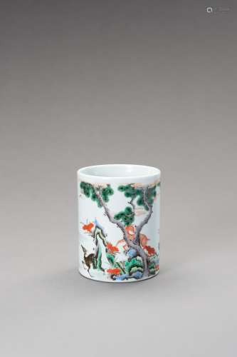 A FAMILLE VERTE 'DEERS AND CRANES' BRUSHPOT, BITON...