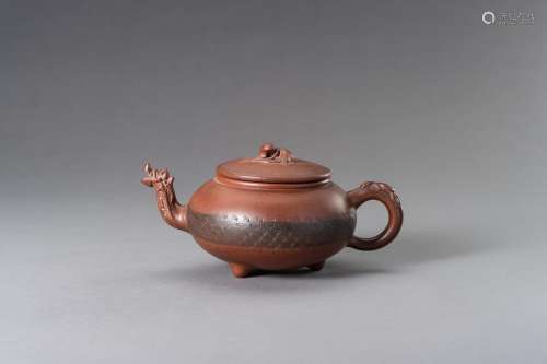 A MOULDED YIXING ZISHA 'DRAGON' TEAPOT AND COVER, ...