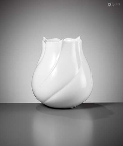 NISHIYAMA SHOSAKU: A LARGE WHITE-GLAZED FLORAL-SHAPED PORCEL...