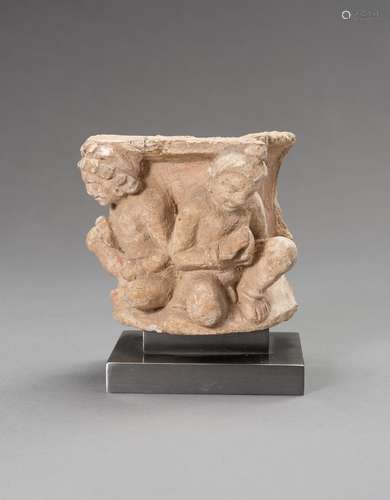 A GANDHARA STUCCO FRAGMENT WITH ADORANTS