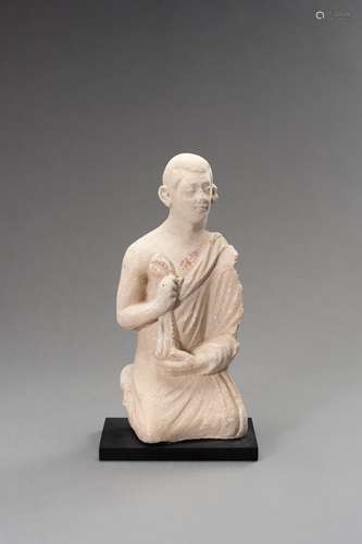 A STUCCO FIGURE OF A MONK, GANDHARA