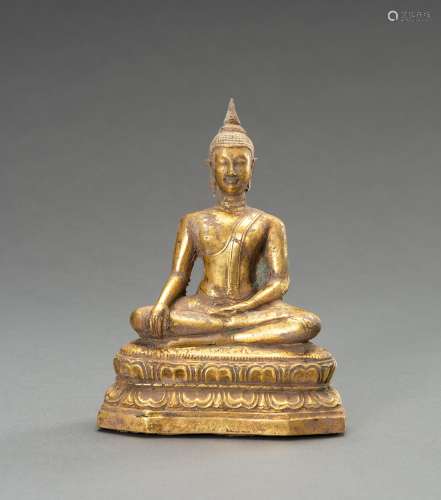 A GOLD REPOUSSE FIGURE OF BUDDHA SHAKYAMUNI, AYUTTHAYA STYLE