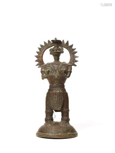 A BASTAR BRONZE OF A FEMALE DEITY WITH BOWL AND JEWEL
