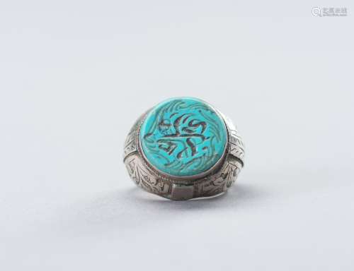 A PERSIAN SILVER RING WITH TURQUOISE MATRIX INTAGLIO, 19TH C...