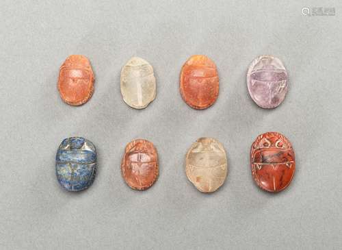 A GROUP OF EIGHT SCARAB HARDSTONE PENDANTS