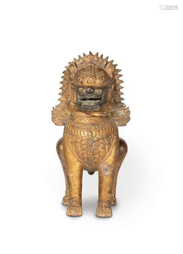 THAILANDE - XXe siècle<br />
Statuette de lion en bronze laq...