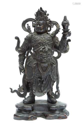 A superb Chinese bronze figure of Dhanada