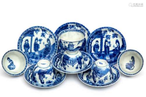 A set of blue and white cups and saucers with European style...