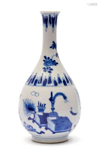 A blue and white pear shaped bottle vase