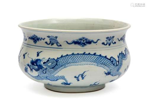 A large blue and white  dragon  censer