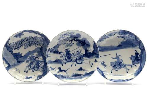 Three blue and white hunting scene dishes