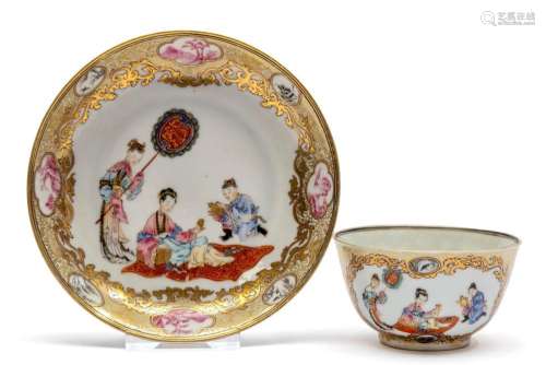 A fine famille rose cup and saucer