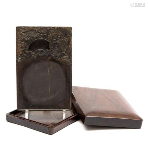 A Chinese duan stone inkstone in wooden box