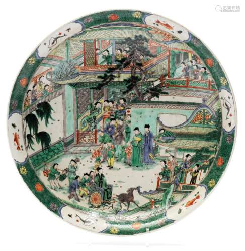 A large famille verte dish with many figures