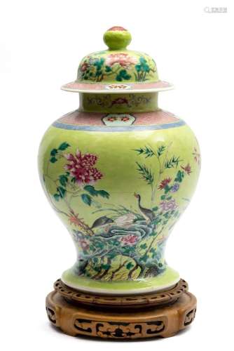 A lime green-ground famille rose baluster vase