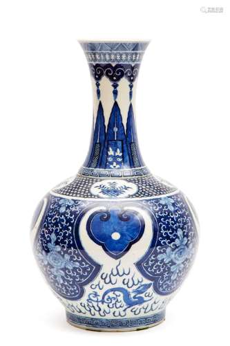 A large blue and white bottle vase