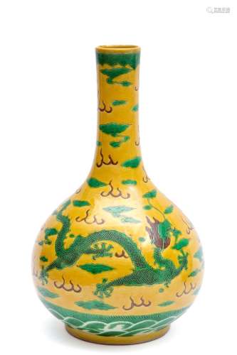 A tall sancai biscuit ware bottle vase