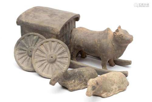 A Han terracotta ox and cart with two sheep