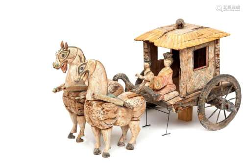 A rare Han dynasty wooden cart with two horses and figures