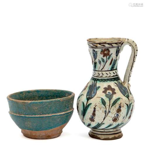 An Ottoman Iznik ewer with a blue glazed Persian bowl