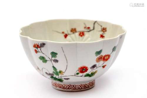 A Kakiemon chrysanthemum relief fluted bowl