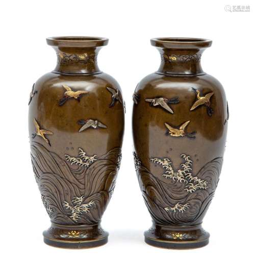 A pair of Japanese bronze inlaid vases