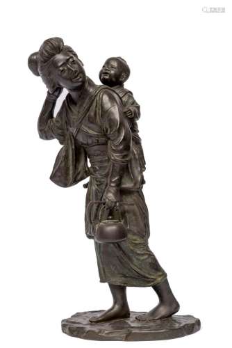 A Japanese Tokyo School bronze of a mother carrying her chil...