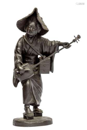 A Japanese Tokyo School bronze of a bijin playing a shamisen