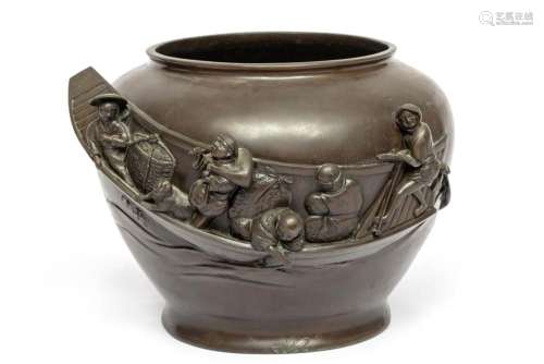 A Japanese bronze vase with relief