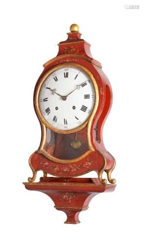 A RED LACQUERED BRACKET CLOCK