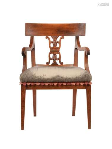 A CONTINENTAL STAINED ASH OPEN ARMCHAIR