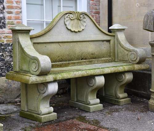 A STONE COMPOSITION GARDEN SEAT IN GEORGE II STYLE