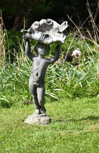 A FLORENTINE LEAD FIGURAL BIRD BATH