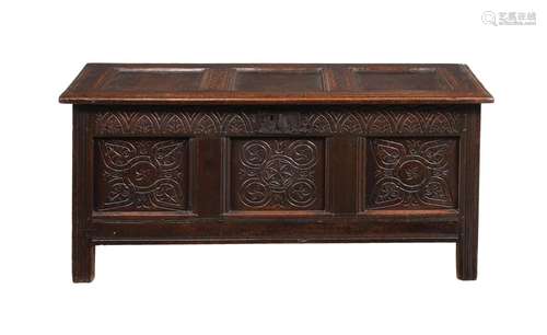 A CHARLES II PANELLED OAK CHEST