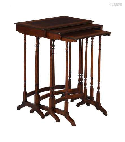 Y A NEST OF THREE REGENCY ROSEWOOD AND CROSSBANDED TABLES