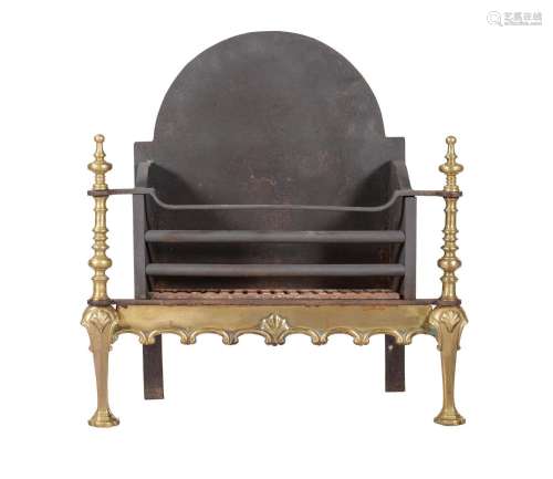 A BRASS AND CAST IRON FIRE BASKET IN BAROQUE TASTE
