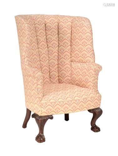 A MAHOGANY AND UPHOLSTERED BARREL BACK ARMCHAIR IN GEORGE II...