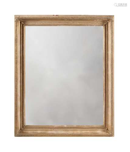 A RECTANGULAR GILTWOOD AND COMPOSITION WALL MIRROR