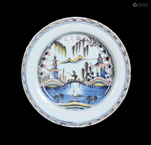 AN ENGLISH DELFT POLYCHROME CHINOISERIE CHARGER