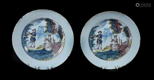 A PAIR OF ENGLISH DELFT POLYCHROME PLATES