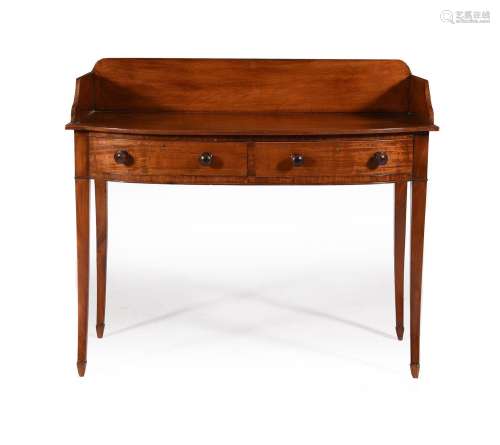 A REGENCY MAHOGANY BOWFRONT DRESSING TABLE