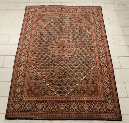 Tapis Tabriz extra fin en laine et soie.