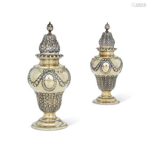 A PAIR OF LATE VICTORIAN SILVER GILT CASTORS