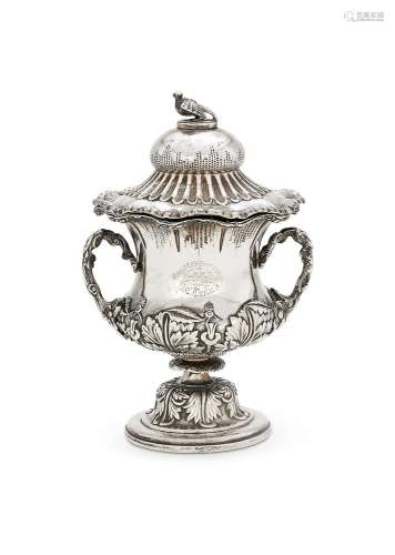 AN INDIAN COLONIAL SILVER CAMPANA CUP AND COVER