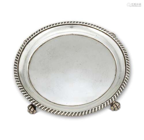 AN INDIAN COLONIAL SILVER SMALL CIRCULAR TEA POT STAND