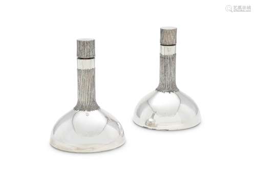 A PAIR OF SILVER DECANTERS